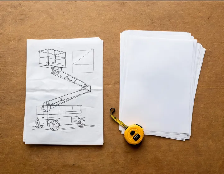 Buyer brief laid beside platform geometry sketches